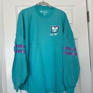 Official Disney Parks Spirit Jersey size M
Teal and purple shimmer